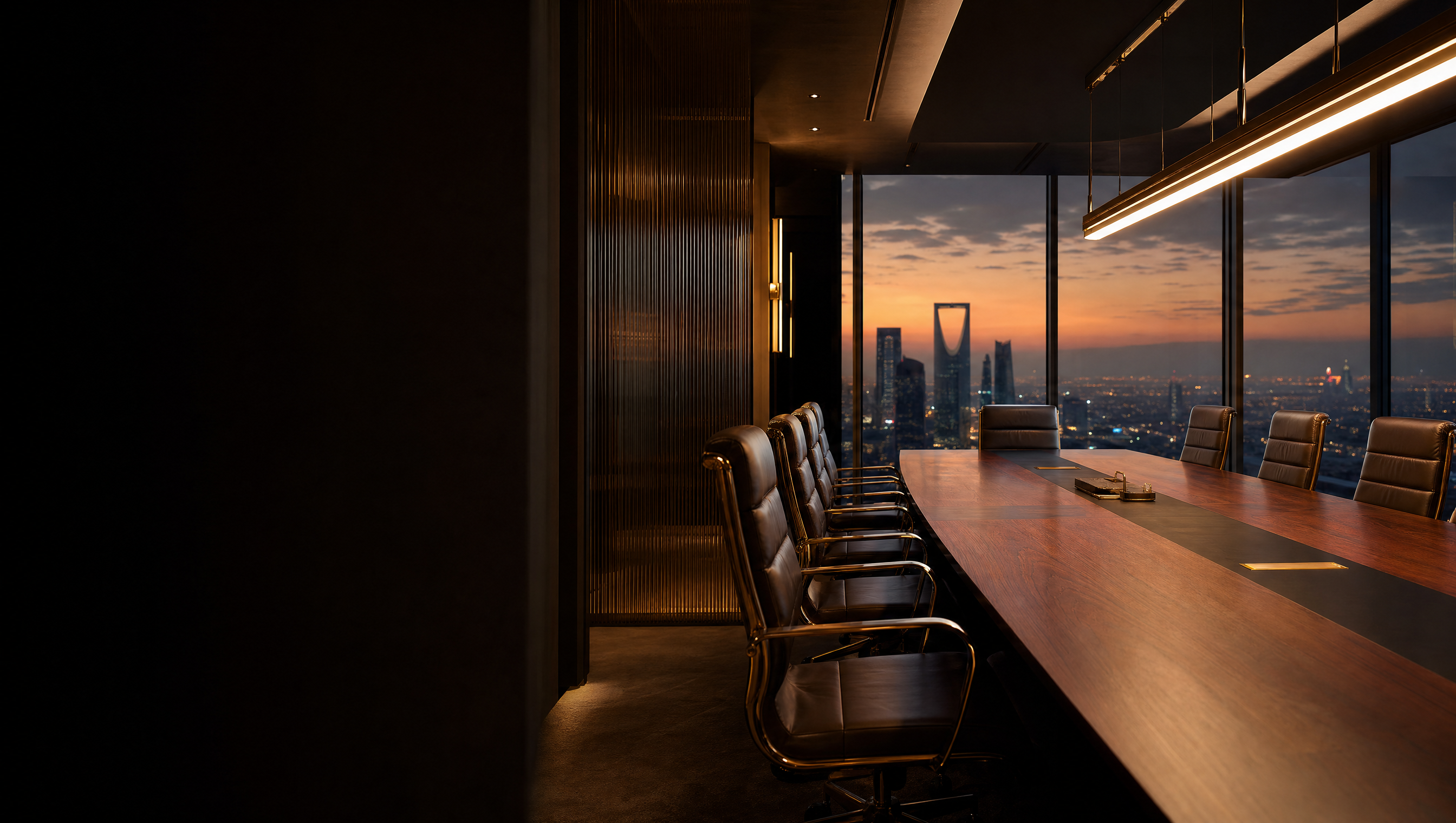 Executive boardroom fitout overlooking the Riyadh skyline at dusk